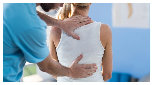 Chiropractor placing hands on a woman’s upper and lower back